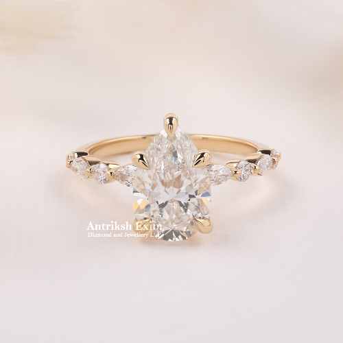 Pear-Cut Lab-Grown Diamond Engagement Ring – 14K Yellow Gold Marquise Accent